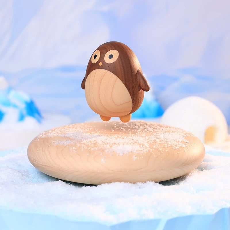 Levitating Penguin Black Walnut Sculpture detail