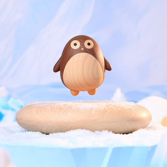 Levitating Penguin Black Walnut Sculpture